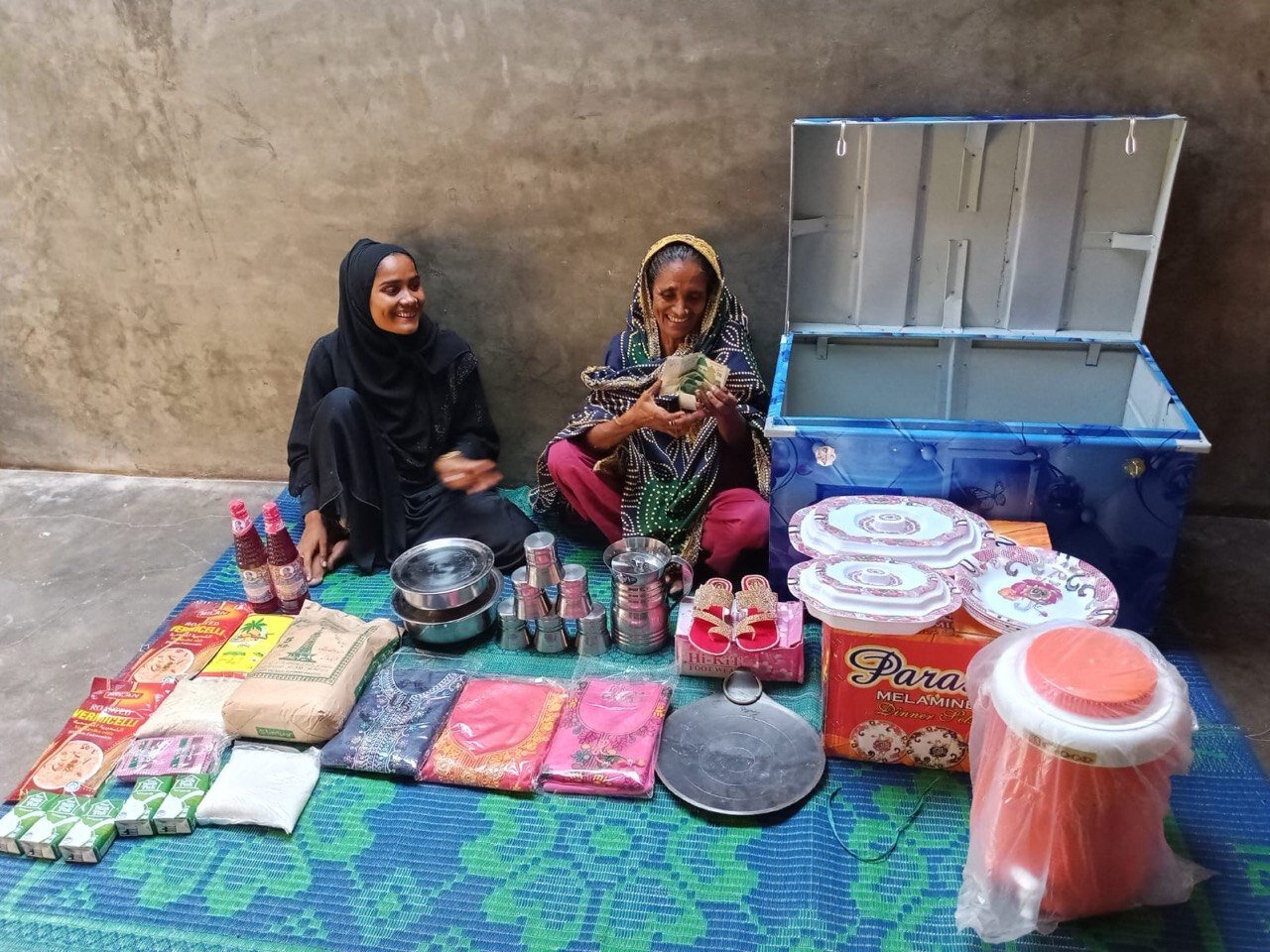 The bride and her mother with her jahez. Thank you for helping her start her new home with joy.